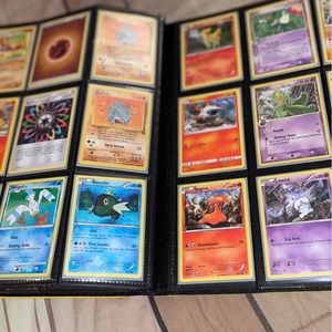 Yellow PokΓ©mon collections book it contains an assortment of random cards